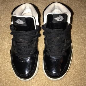 Patent leather black Jordan shoes